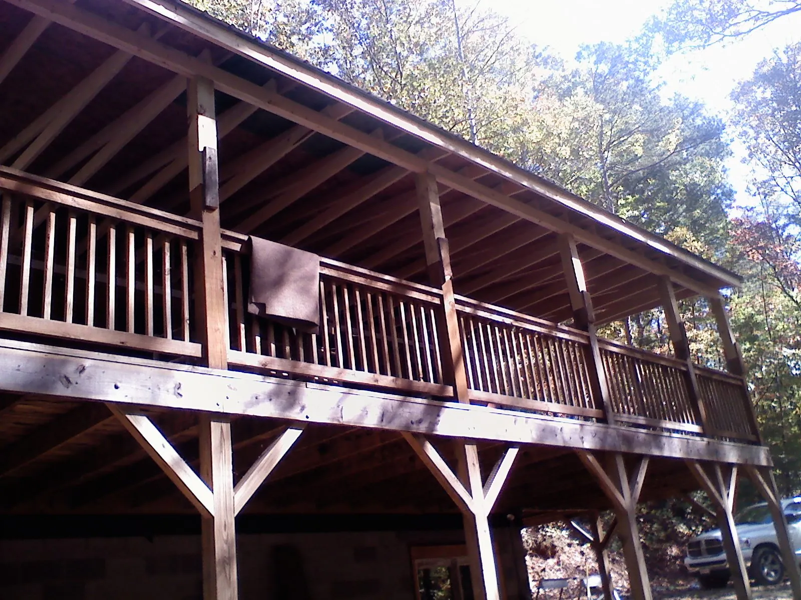 Timber framing under a new elevated porch and deck — Roof Leak Repair in Eleva by Roofing Brothers